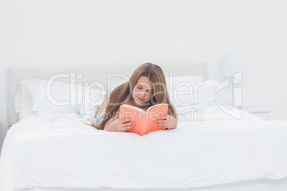 Asleep girl holding a book