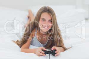 Young girl playing video games