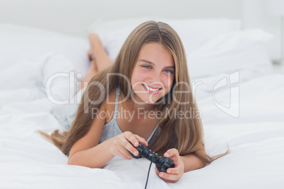 Cute girl playing video games