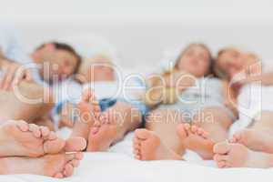 Close up of the feet of a family