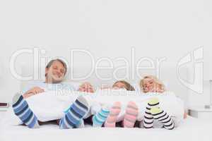 Family wearing stripey socks