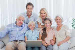 Extended family sitting on couch