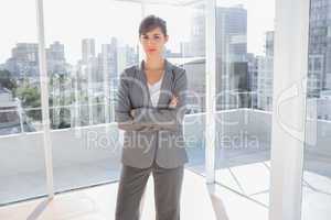 Confident businesswoman in bright office