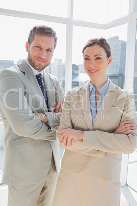 Confident business partners smiling at camera