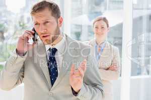 Businessman speaking on phone