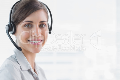 Call centre agent smiling at camera