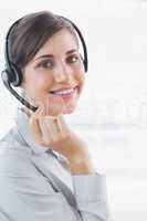 Call centre agent smiling at the camera