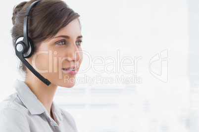 Pretty call centre agent smiling