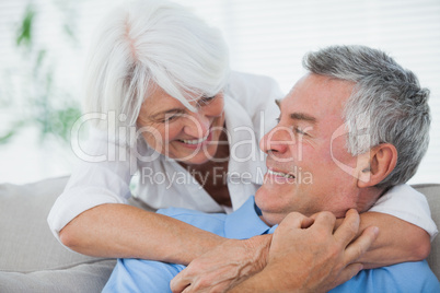 Woman hugging husband