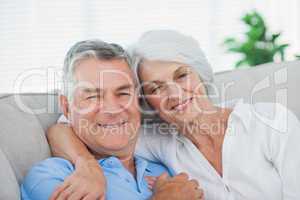 Couple relaxing on the couch