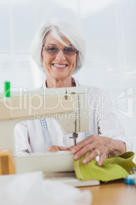 Woman using the sewing machine