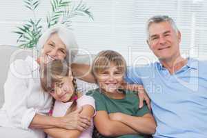 Portrait of grandparents with their grandchildren