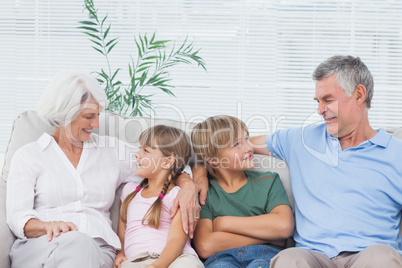 Grandparents speaking with their grandchildren