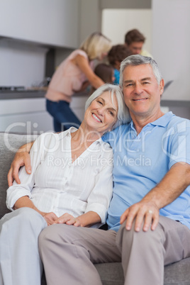 Elderly couple sitting on the couch