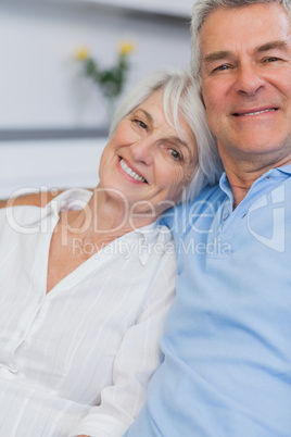 Elderly couple embracing