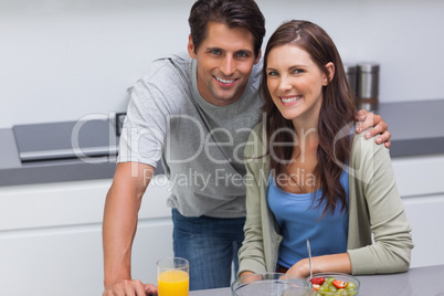 Couple sitting in the kitchen
