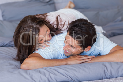 Couple having fun on the bed