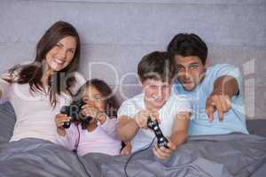 Happy family playing video games