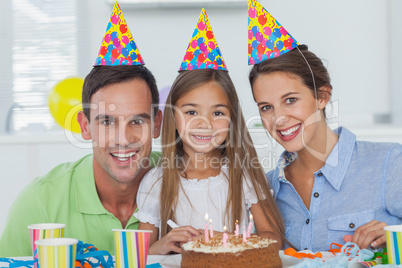 Parents celebrating their little girls birthday