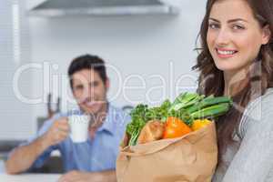 Woman with groceries bag