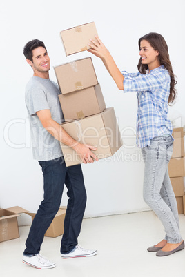 Woman giving boxes to her husband