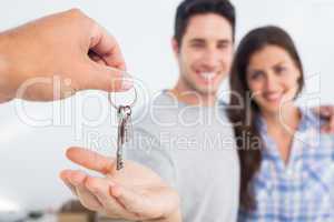 Man being given a house key