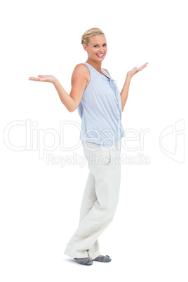 Happy woman standing with hands up
