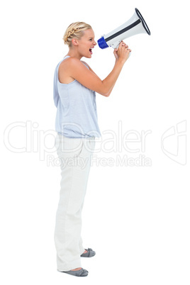 Blonde woman shouting through megaphone