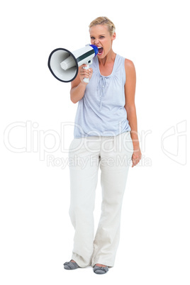 Blonde shouting holding a megaphone