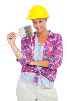 Beautiful handy woman holding a brush