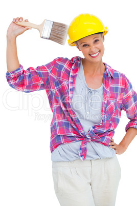 Happy handy woman looking at camera