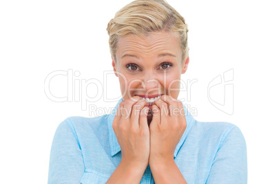 Stressed attractive young woman looking at camera