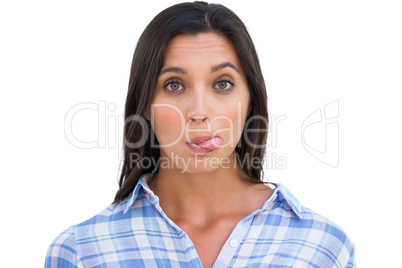Silly woman with tongue out looking at camera