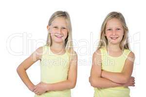 Smiling girls with arms crossed
