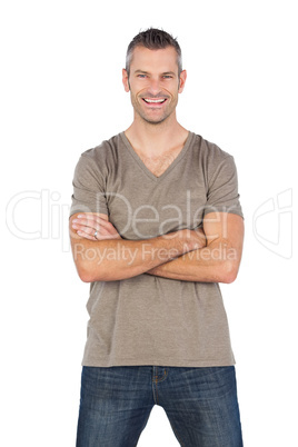 Cheerful man with arms crossed