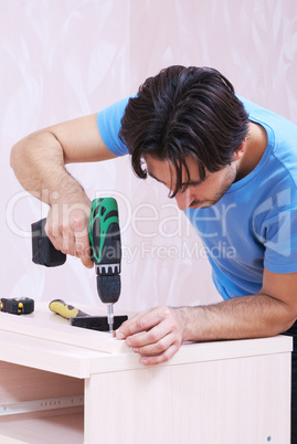 carpenter with drill