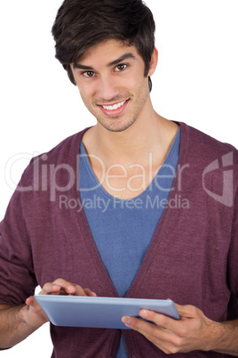 Smiling young man using tablet pc