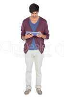 Young man focused on his tablet pc