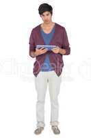 Young man with tablet pc looking at the camera