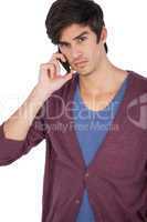 Upset young man with mobile phone