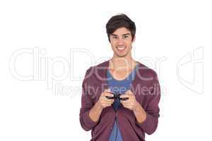 Smiling man holding joystick