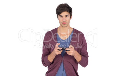 Young man concentrated on video games