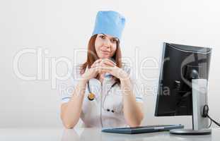 doctor at a computer
