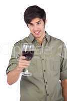 Smiling man holding red wine glass