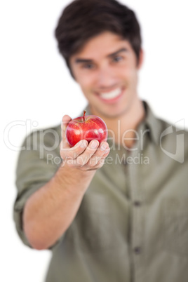Man holding apple on his hand