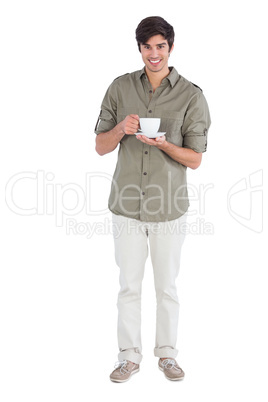Happy man holding cup of coffee