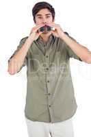 Man surprised with binoculars