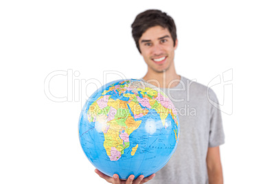 Man presenting a globe