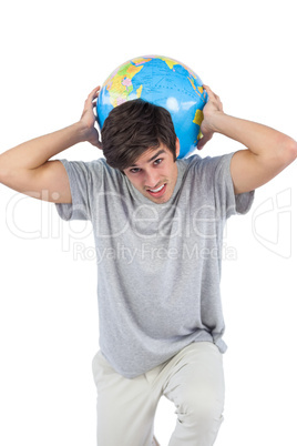 Man holding a globe on his back