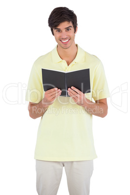 Student holding notebook